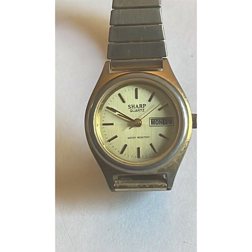 Sharp Quartz Japan movement Day/date window Womens Stretch Watch